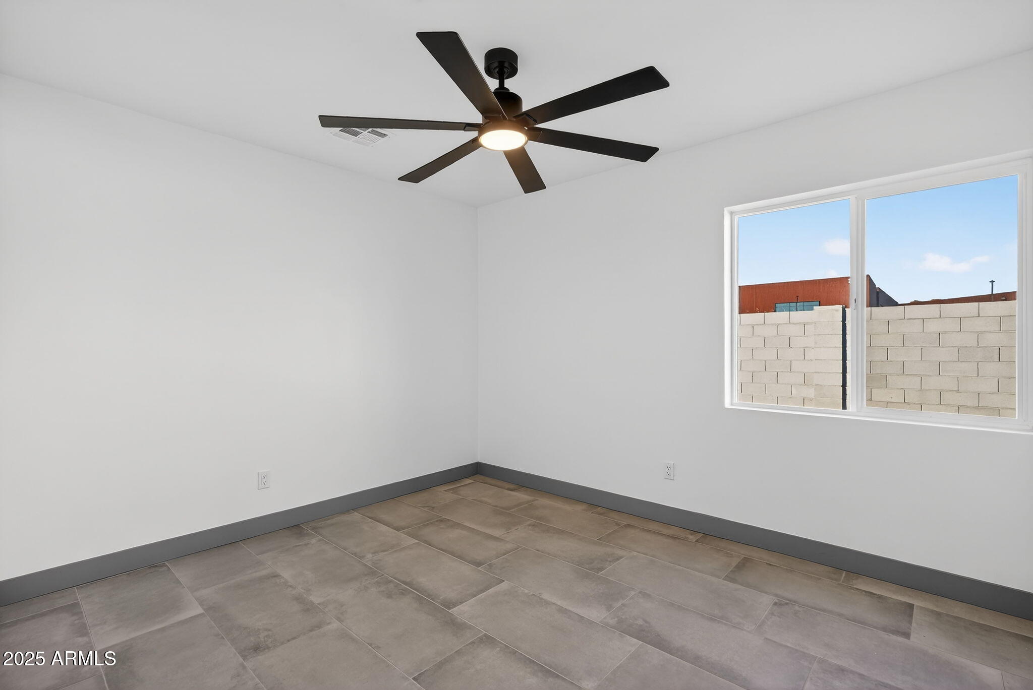 3241 North 27th Place Phoenix, AZ 85016 - Photo 18 of 25 a view of an empty room
