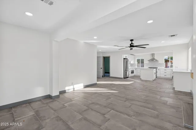 a view of a livingroom with wooden floor