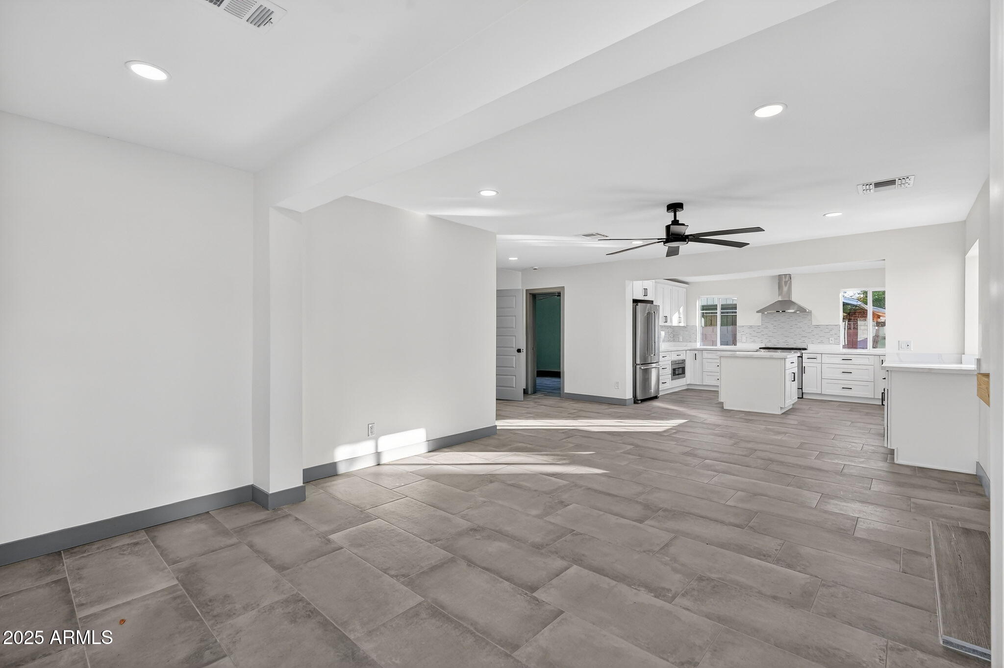 3241 North 27th Place Phoenix, AZ 85016 - Photo 7 of 25 a view of a livingroom with wooden floor