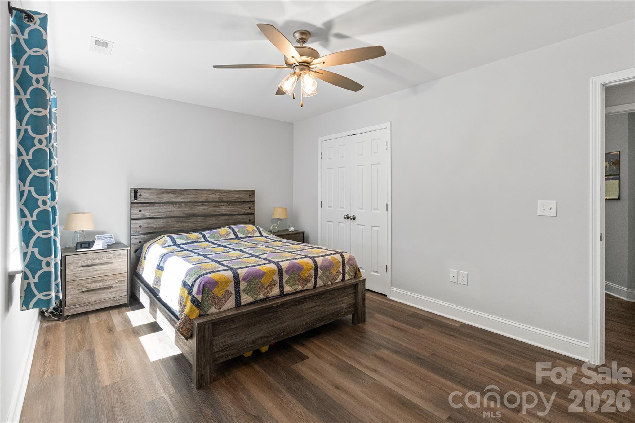 3690 Innes Lane Maiden, NC 28650 - Photo 19 of 34 a bedroom with a bed and a ceiling fan