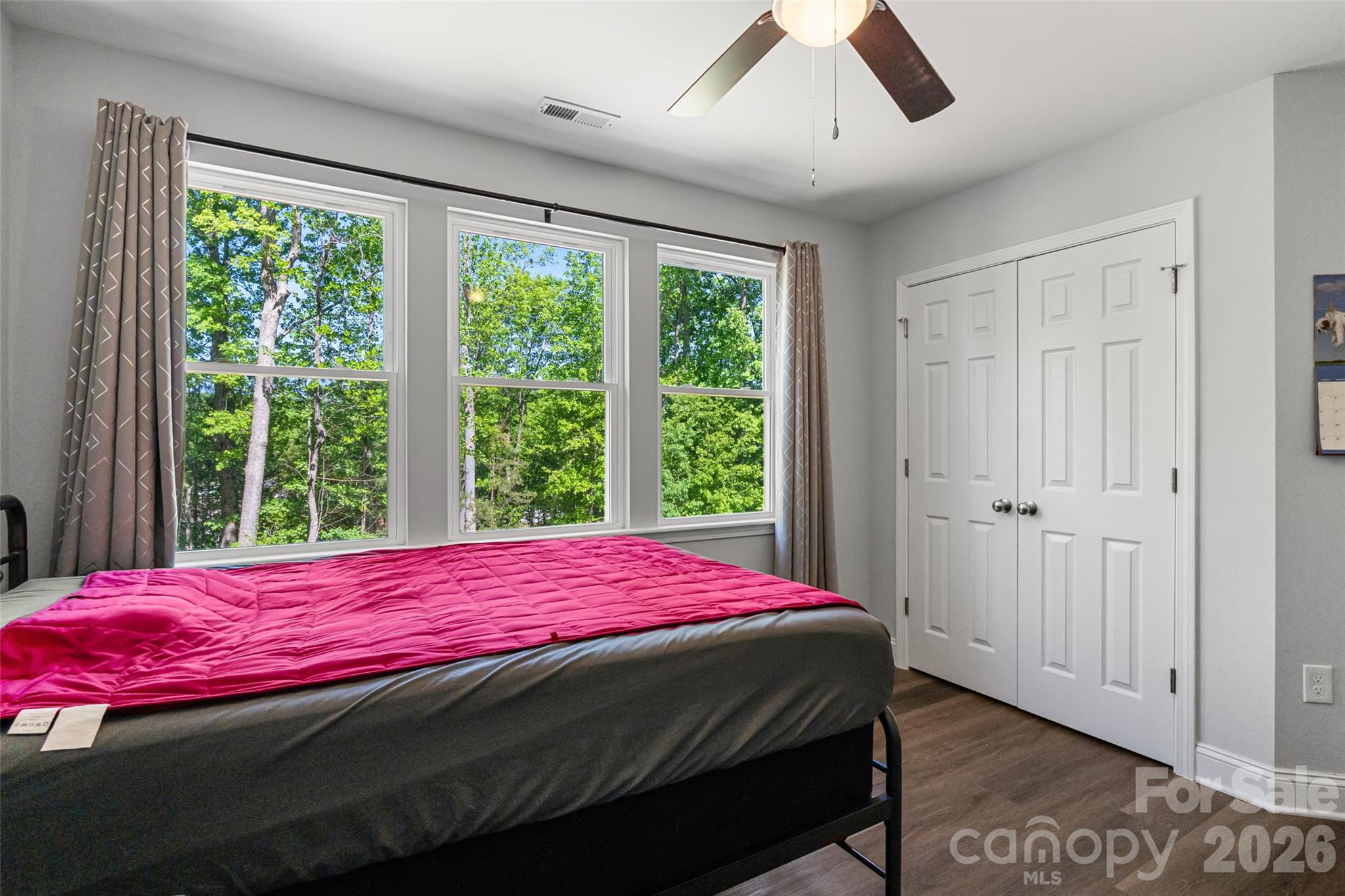 3690 Innes Lane Maiden, NC 28650 - Photo 30 of 34 a bedroom with a bed and wooden floor