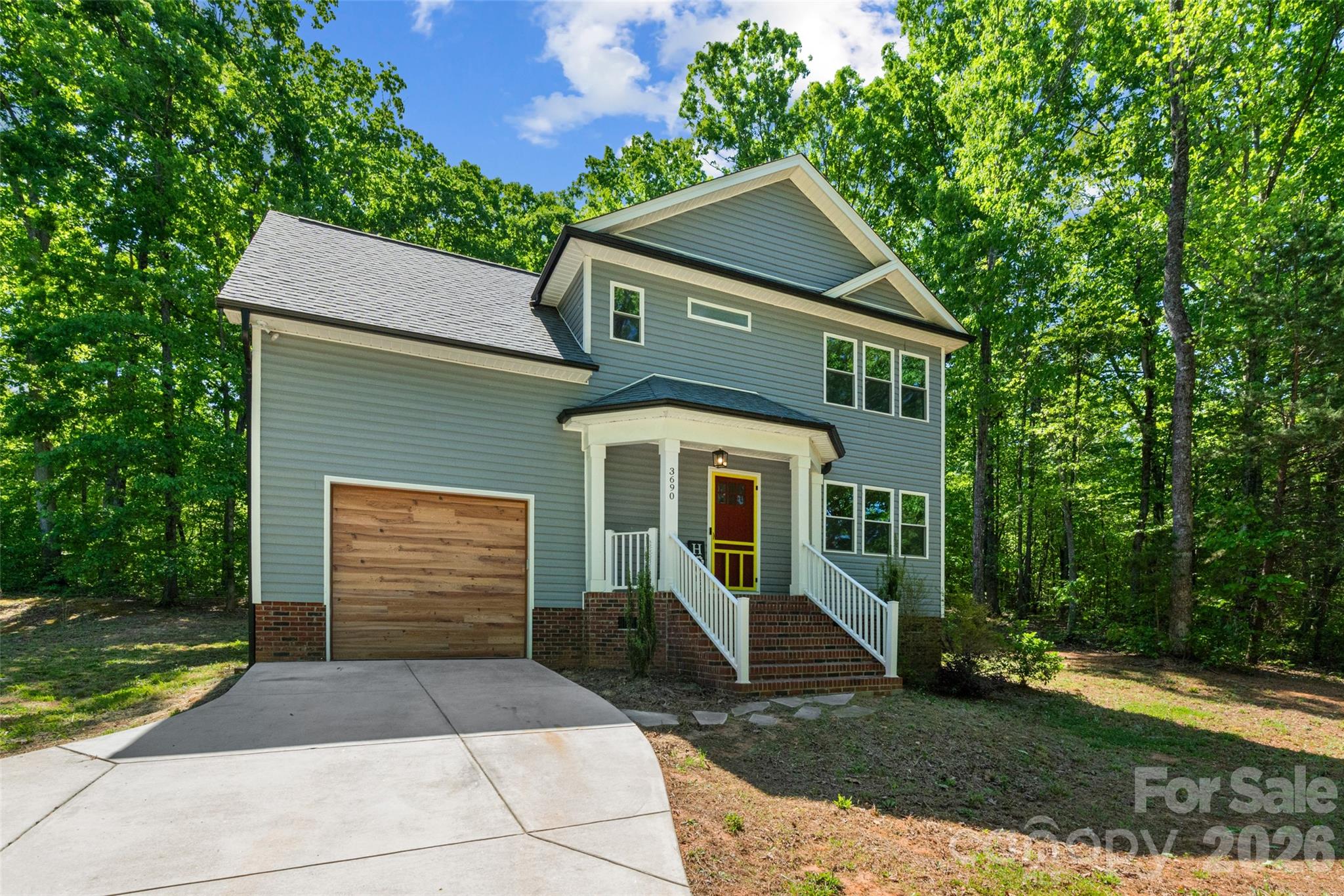 3690 Innes Lane Maiden, NC 28650 - Photo 3 of 34 a front view of a house with a yard