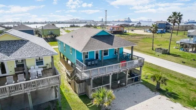 a view of a house with a ocean view