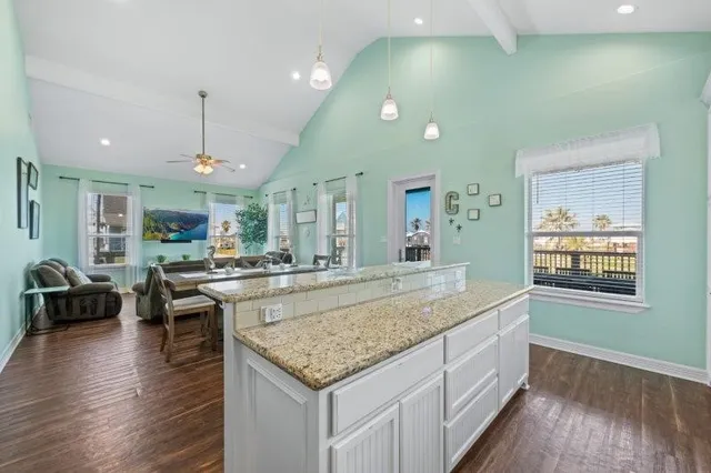 a view of living room and kitchen
