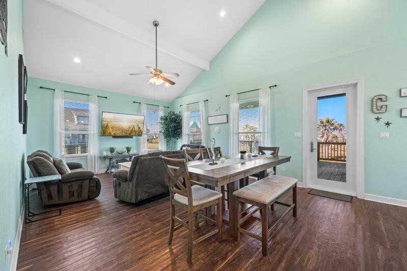 343 Jettyview Road Freeport, TX 77541 - Photo 14 of 44 a living room with furniture a window and a flat screen tv
