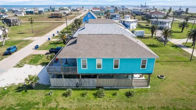 a view of a house with a swimming pool