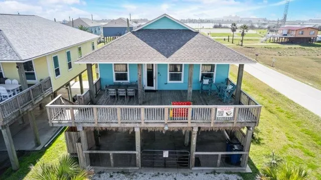 a front view of a house with street