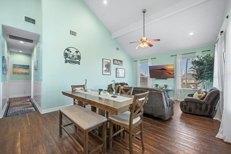 343 Jettyview Road Freeport, TX 77541 - Photo 8 of 44 a view of a livingroom with furniture window and wooden floor