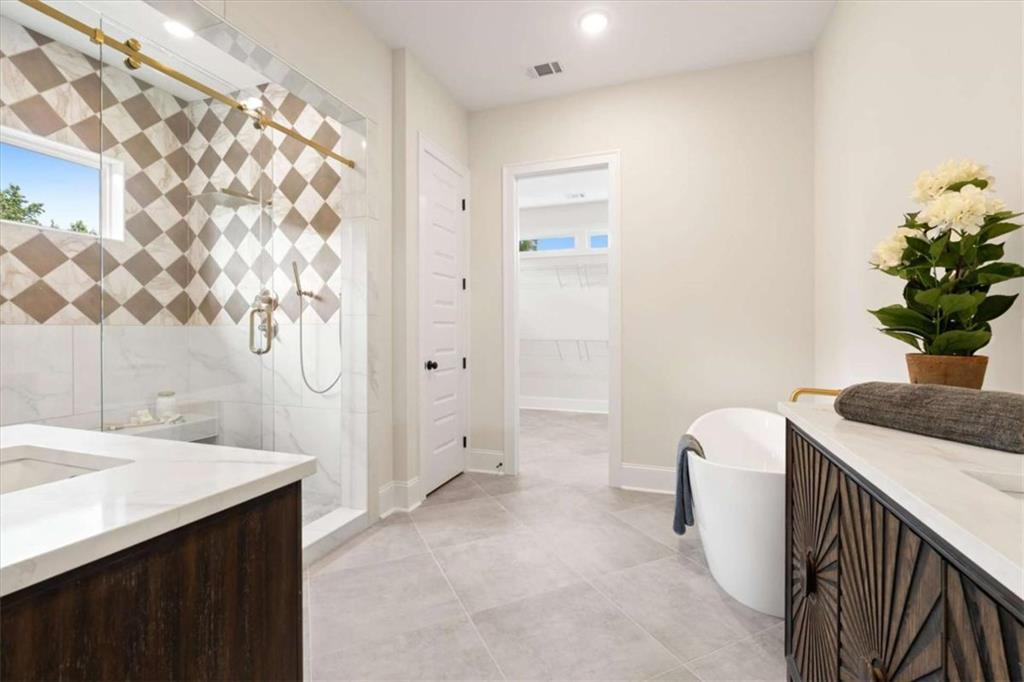 591 Welcome Road Roopville, GA 30170 - Photo 27 of 60 a bathroom with a sink toilet and shower