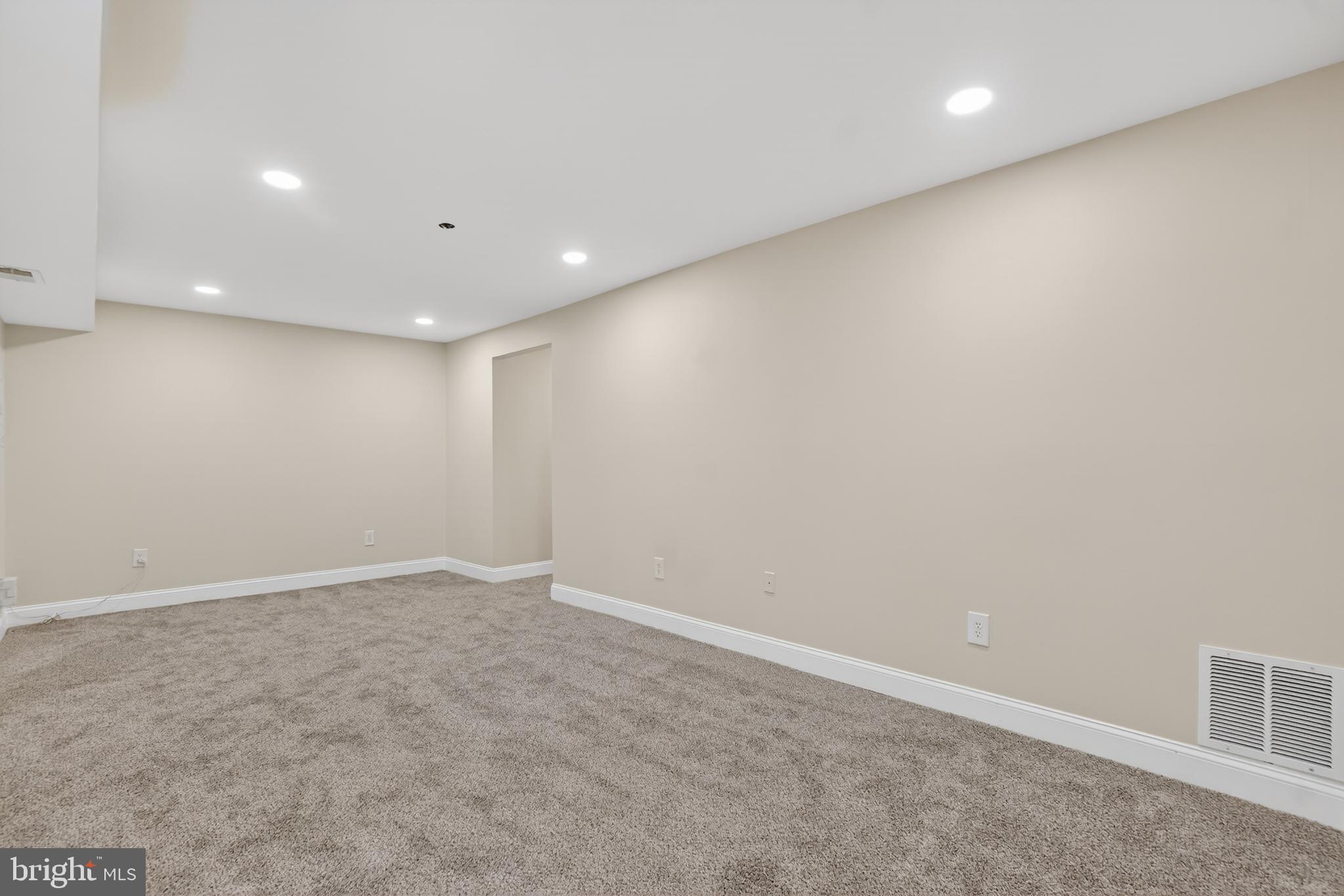 1232 Palmer Road, Unit 111 Fort Washington, MD 20744 - Photo 37 of 45 an empty room with a workbench