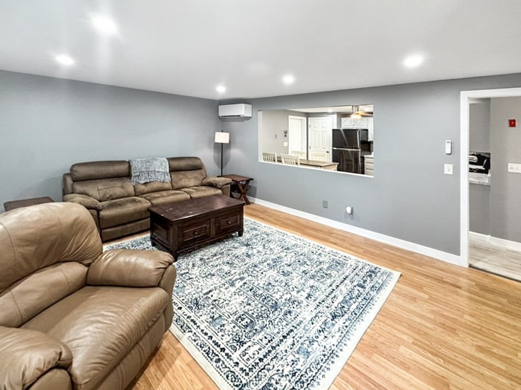 3 Maple Ridge Road, Unit 3 Seabrook, NH 03874 - Photo 8 of 26 a living room with furniture