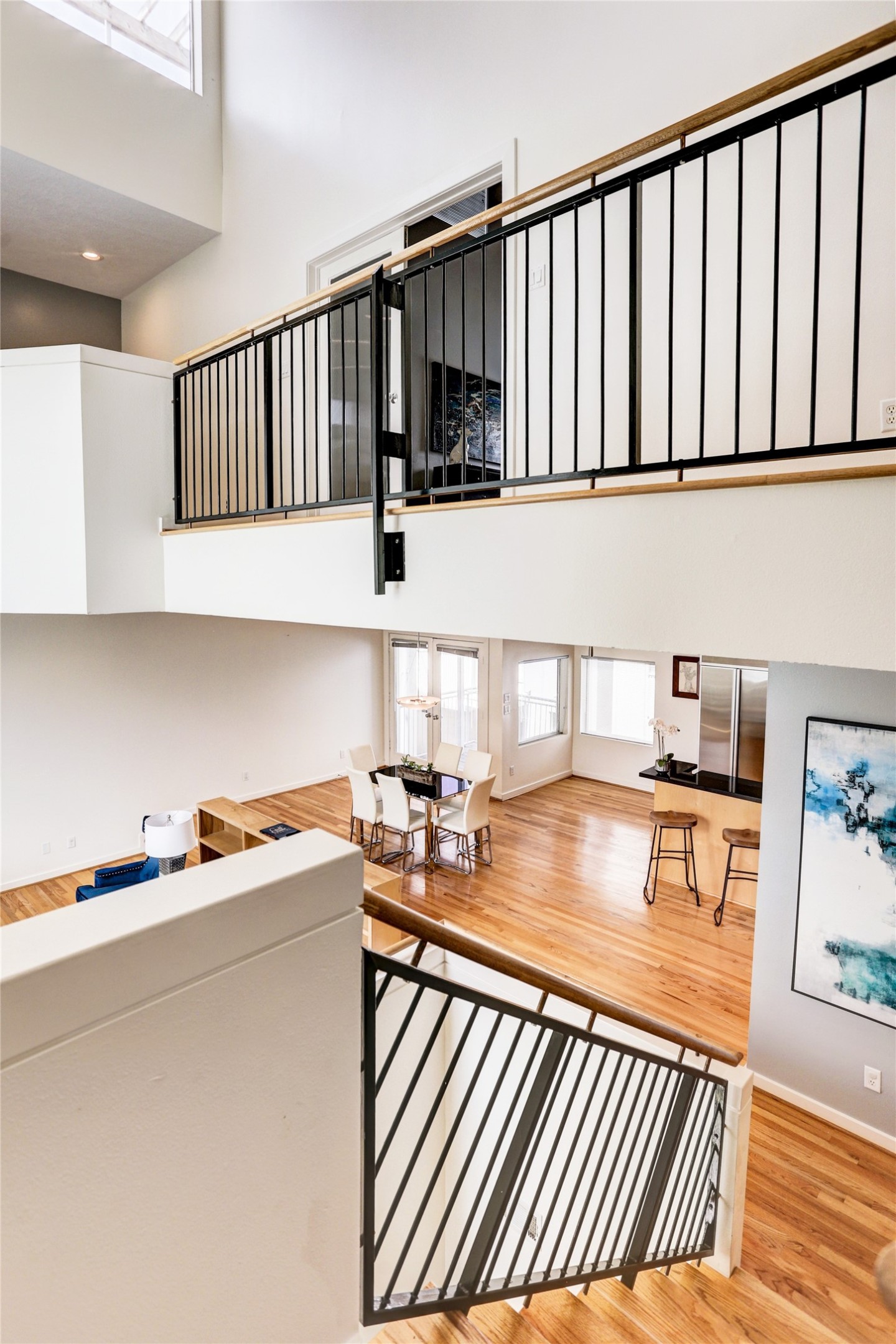 5443 Rose Street Houston, TX 77007 - Photo 13 of 32 a kitchen with stainless steel appliances granite countertop a sink and cabinets