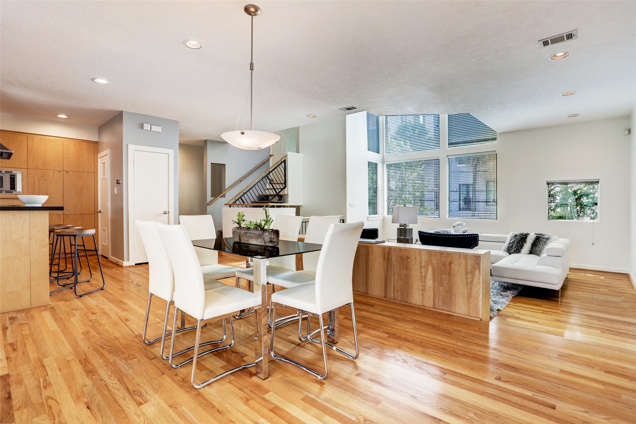 5443 Rose Street Houston, TX 77007 - Photo 16 of 32 a living room with fireplace furniture and a wooden floor