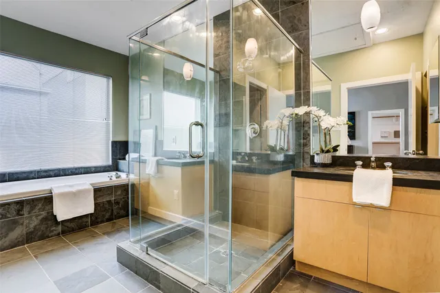 a kitchen with granite countertop a sink and cabinets