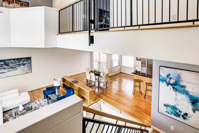 a view of a dining table with kitchen countertops