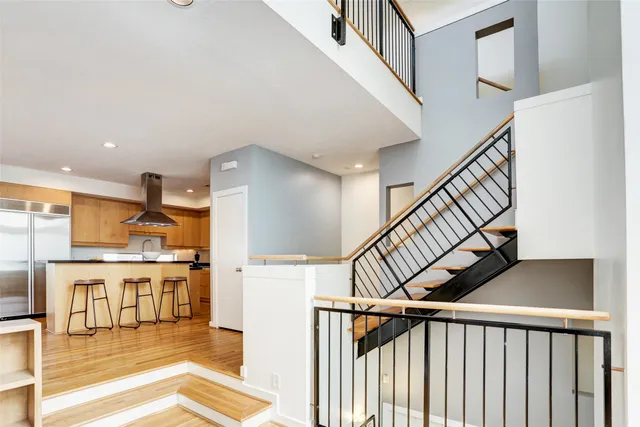 a view of a kitchen and an entryway
