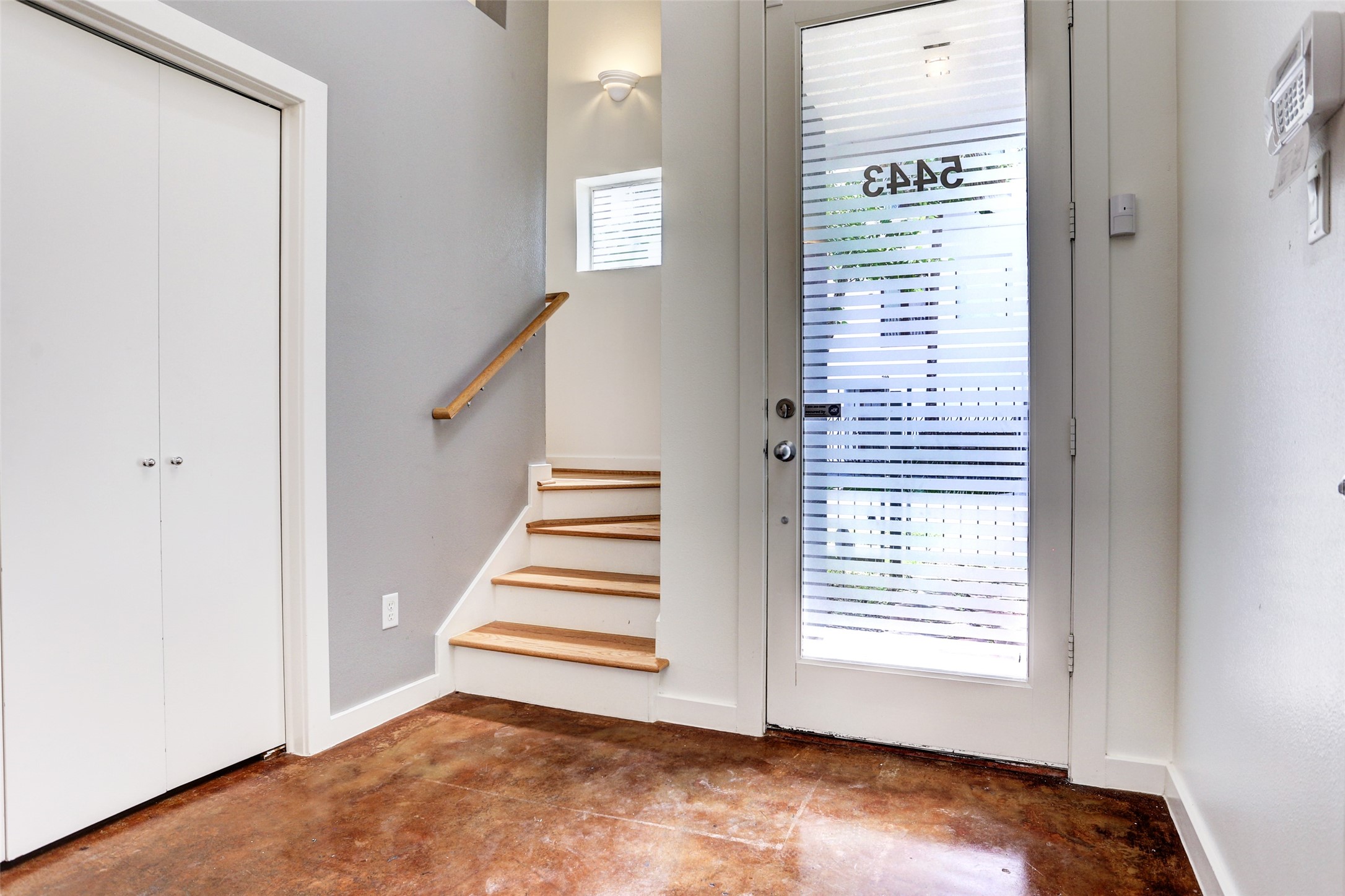 5443 Rose Street Houston, TX 77007 - Photo 9 of 32 a view of an empty room with stairs