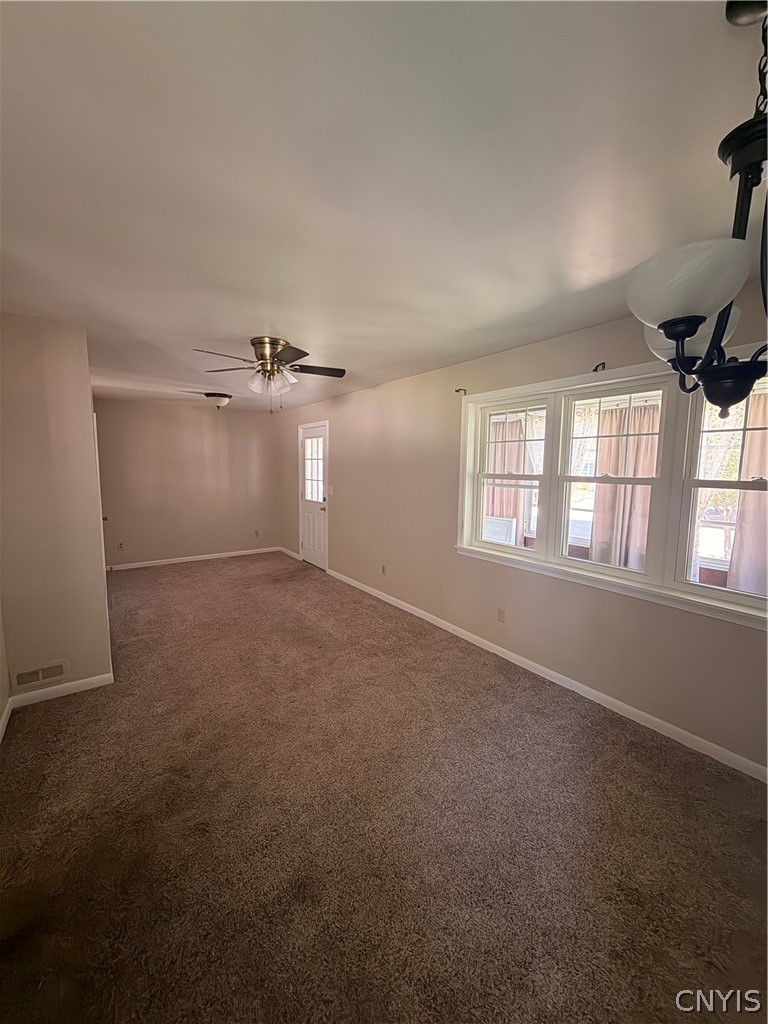 311 Sayles Street Oneida, NY 13421 - Photo 6 of 25 Dining room facing living room