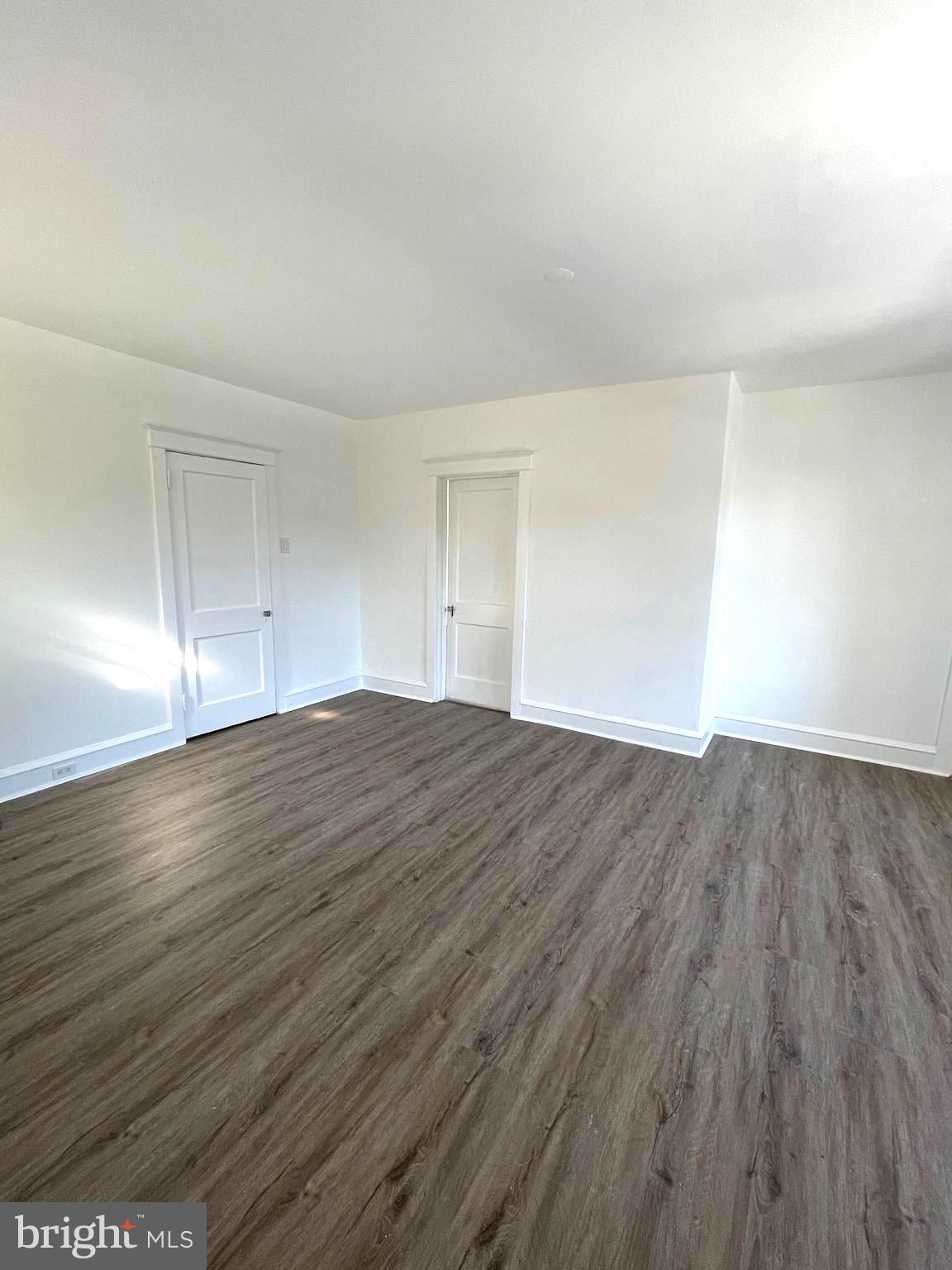 319 Simms Street, Unit 2 Philadelphia, PA 19116 - Photo 14 of 23 a view of empty room with wooden floor