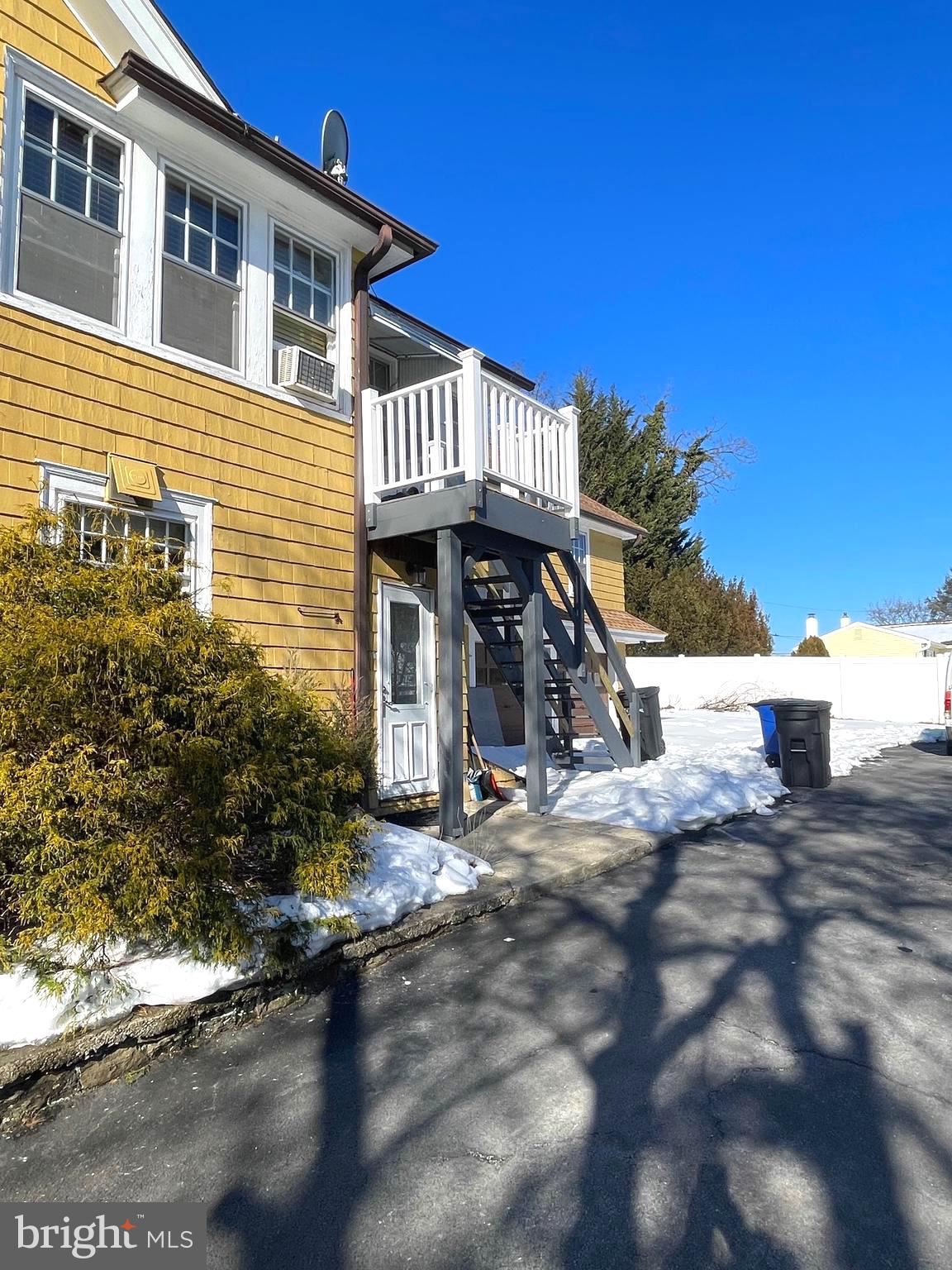 319 Simms Street, Unit 2 Philadelphia, PA 19116 - Photo 6 of 23 a view of a house with a patio