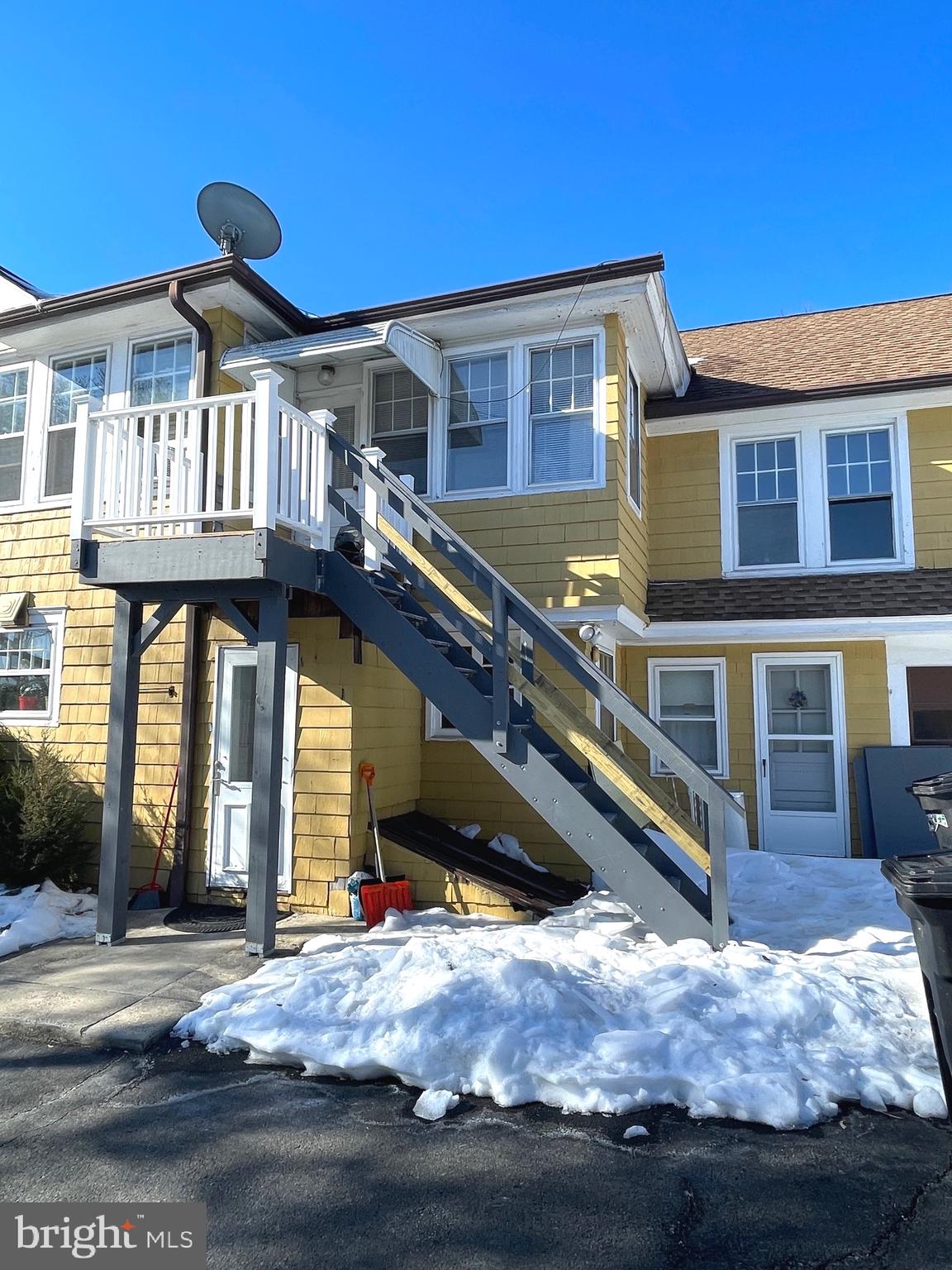 319 Simms Street, Unit 2 Philadelphia, PA 19116 - Photo 7 of 23 a view of a house with a wooden deck