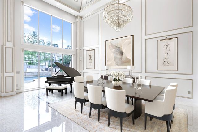 a dining room with furniture a chandelier and wooden floor