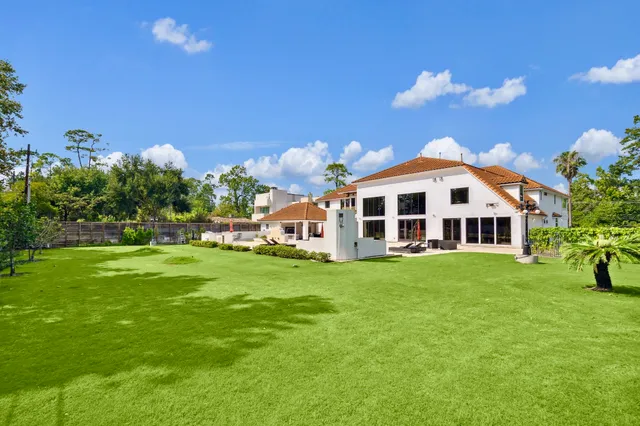 a view of a house with a big yard
