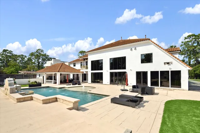 a bedroom with bed and a window
