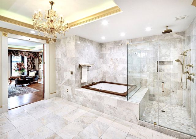 a bedroom with bed and a window