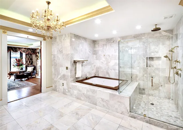 a bedroom with bed and a window