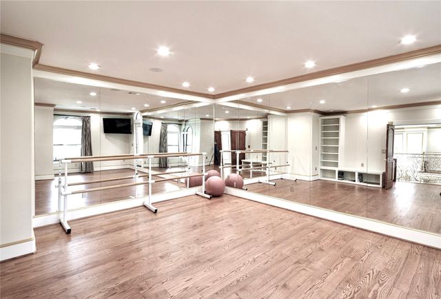 a view of a house with swimming pool and sitting area