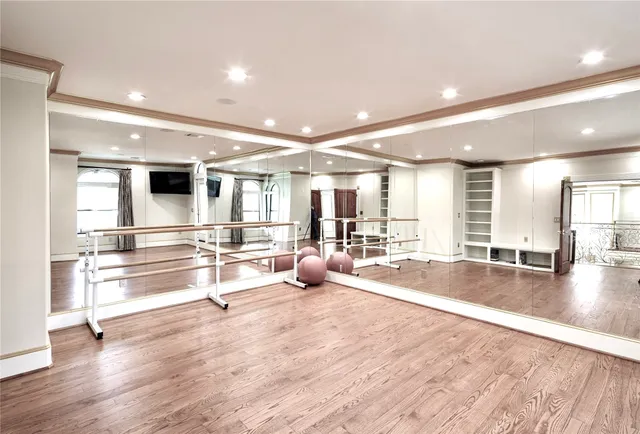 a view of a house with swimming pool and sitting area