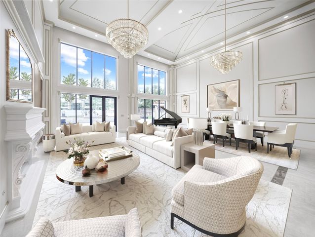 a living room with fireplace furniture and a chandelier