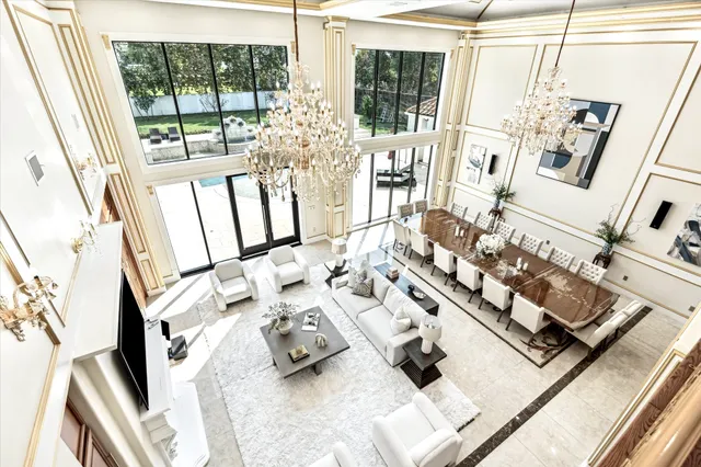 a view of living room with furniture and floor to ceiling window