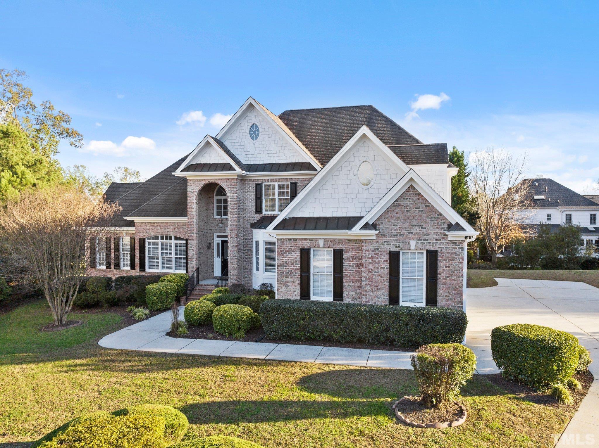 4800 Patton Ridge Court Raleigh, NC 27612 - Photo 15 of 61 a front view of a house with garden