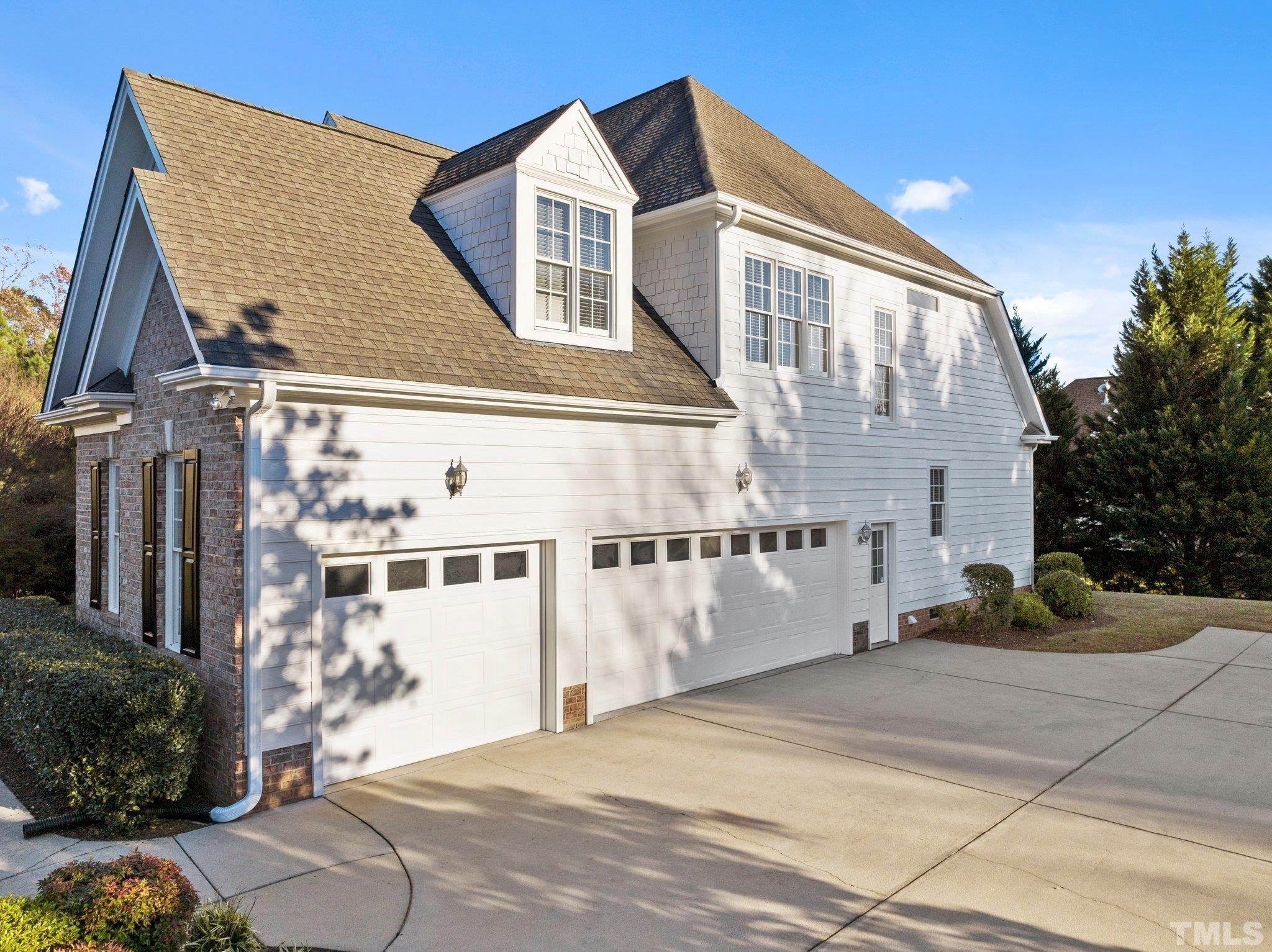 4800 Patton Ridge Court Raleigh, NC 27612 - Photo 17 of 61 a front view of a house with a yard