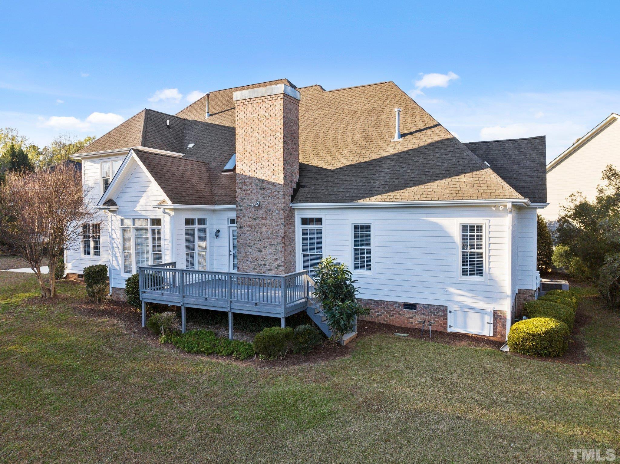 4800 Patton Ridge Court Raleigh, NC 27612 - Photo 20 of 61 a view of a house with a backyard and sitting area
