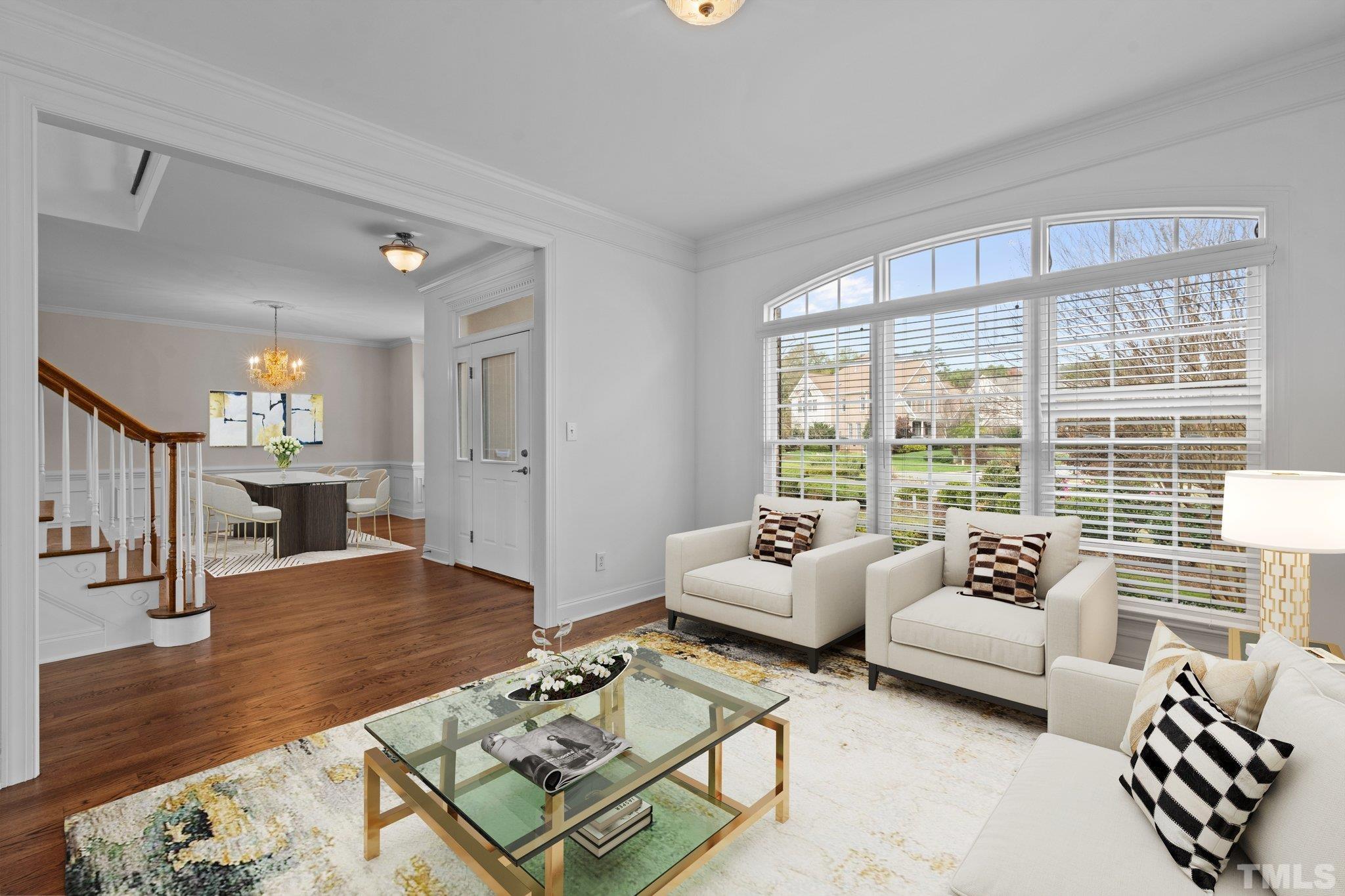 4800 Patton Ridge Court Raleigh, NC 27612 - Photo 2 of 61 a living room with furniture and a large window