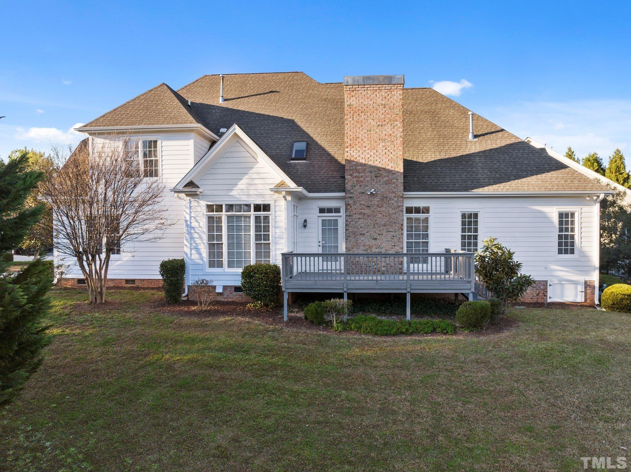 4800 Patton Ridge Court Raleigh, NC 27612 - Photo 23 of 61 a front view of a house with a yard and garage