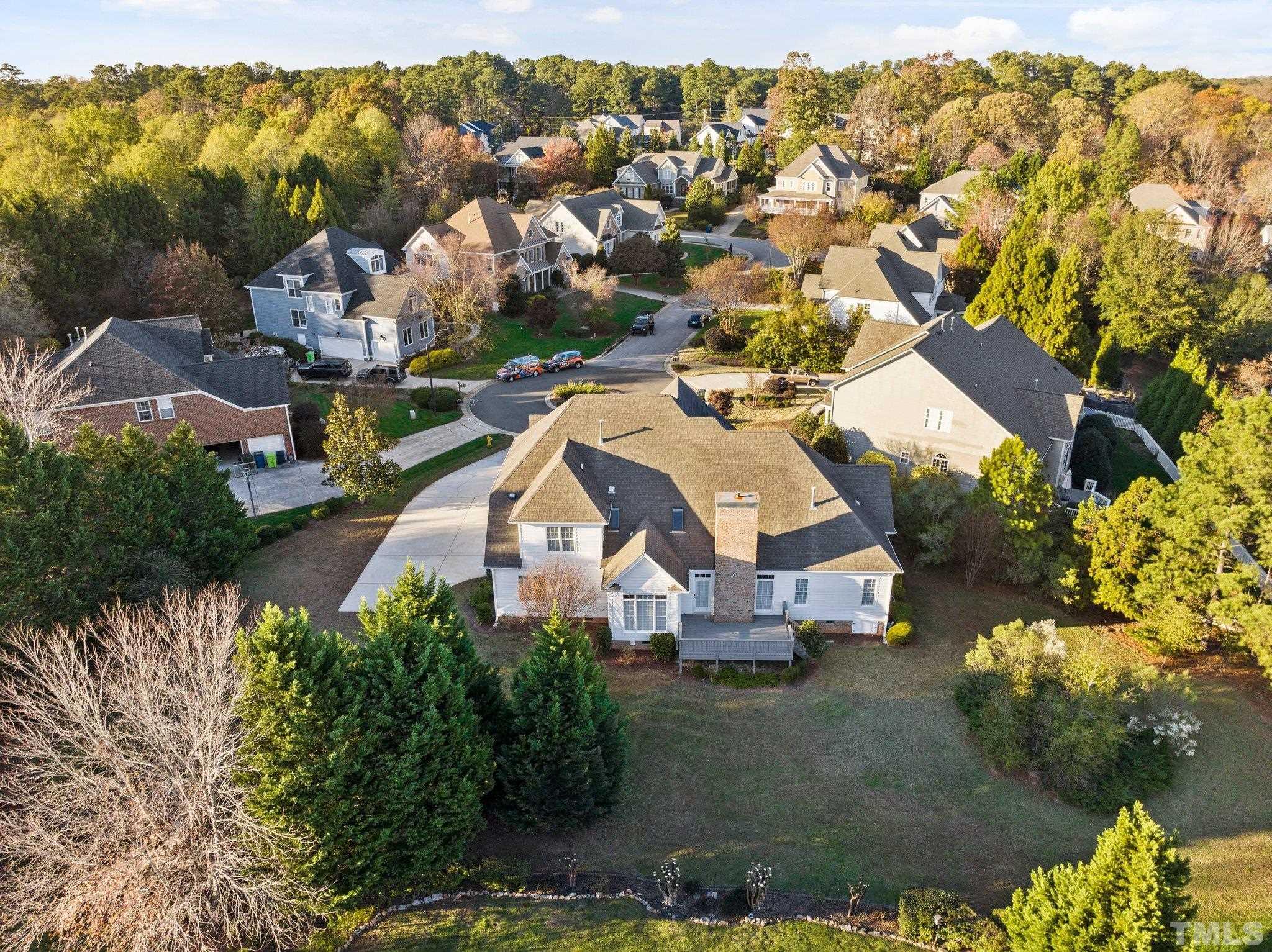 4800 Patton Ridge Court Raleigh, NC 27612 - Photo 24 of 61 an aerial view of residential houses with outdoor space and parking