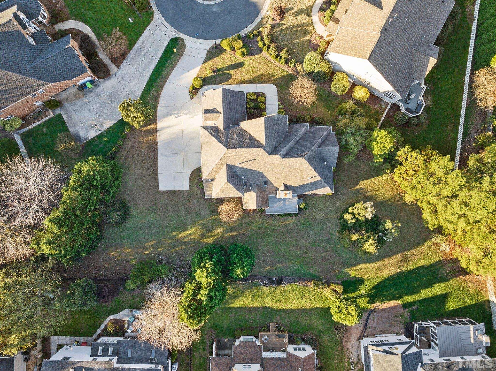 4800 Patton Ridge Court Raleigh, NC 27612 - Photo 25 of 61 an aerial view of a house with a yard and outdoor seating