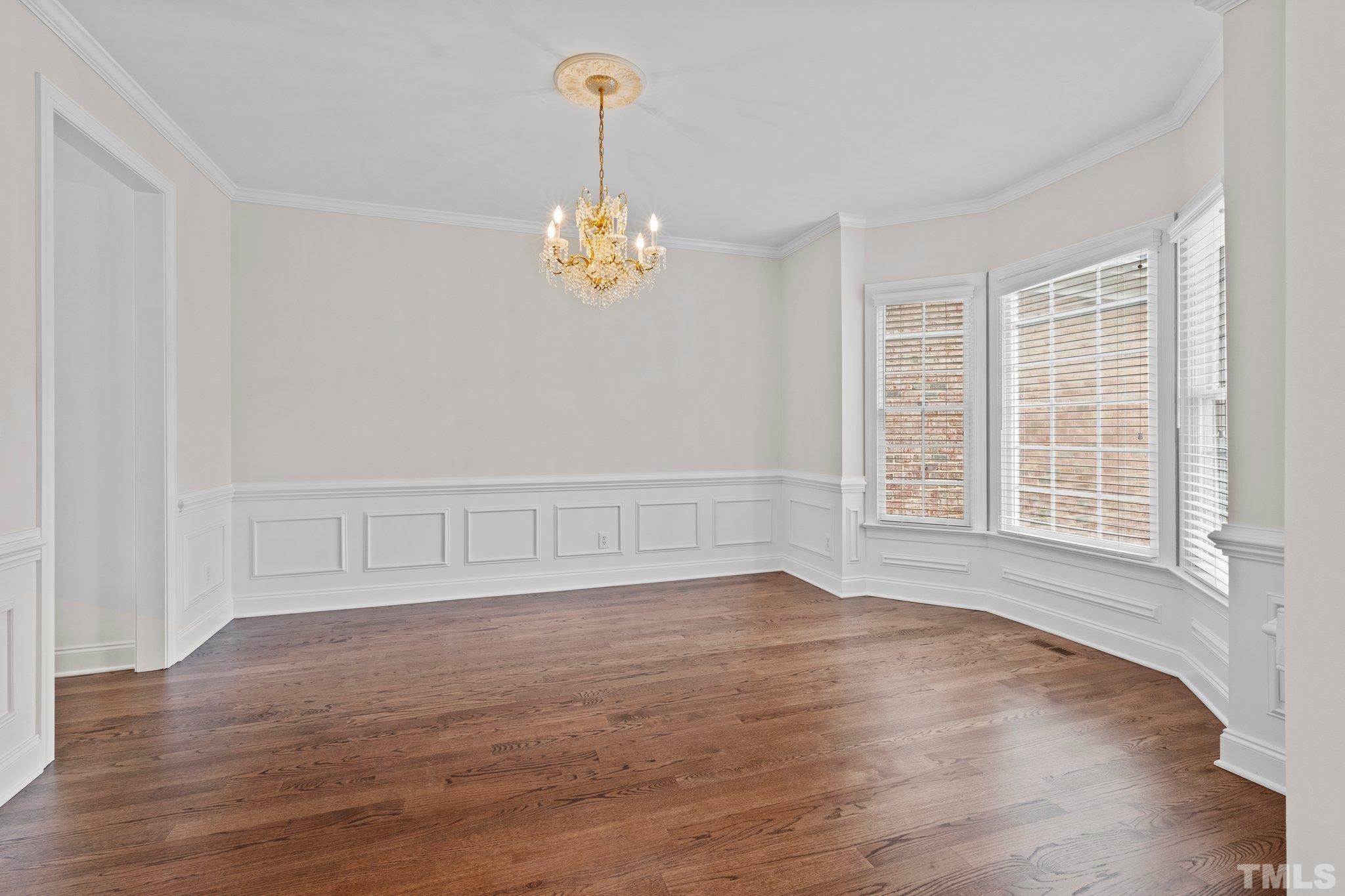 4800 Patton Ridge Court Raleigh, NC 27612 - Photo 34 of 61 an empty room with wooden floor and window