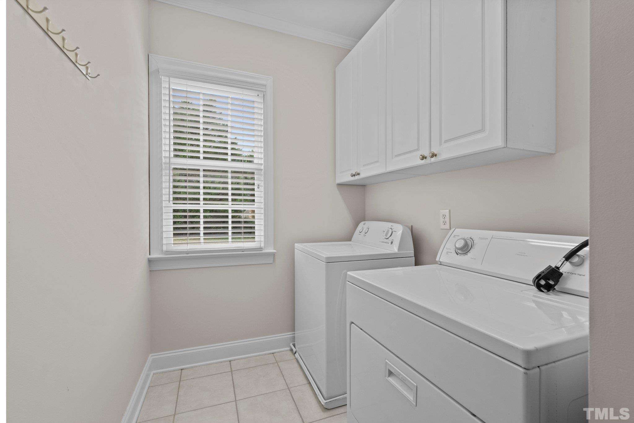 4800 Patton Ridge Court Raleigh, NC 27612 - Photo 44 of 61 a utility room with dryer and washer