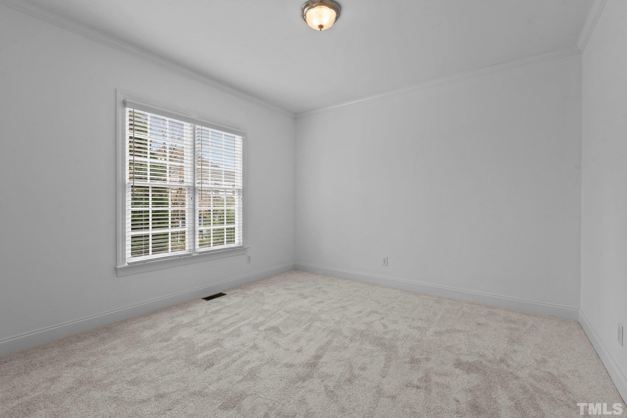 4800 Patton Ridge Court Raleigh, NC 27612 - Photo 45 of 61 an empty room with a window