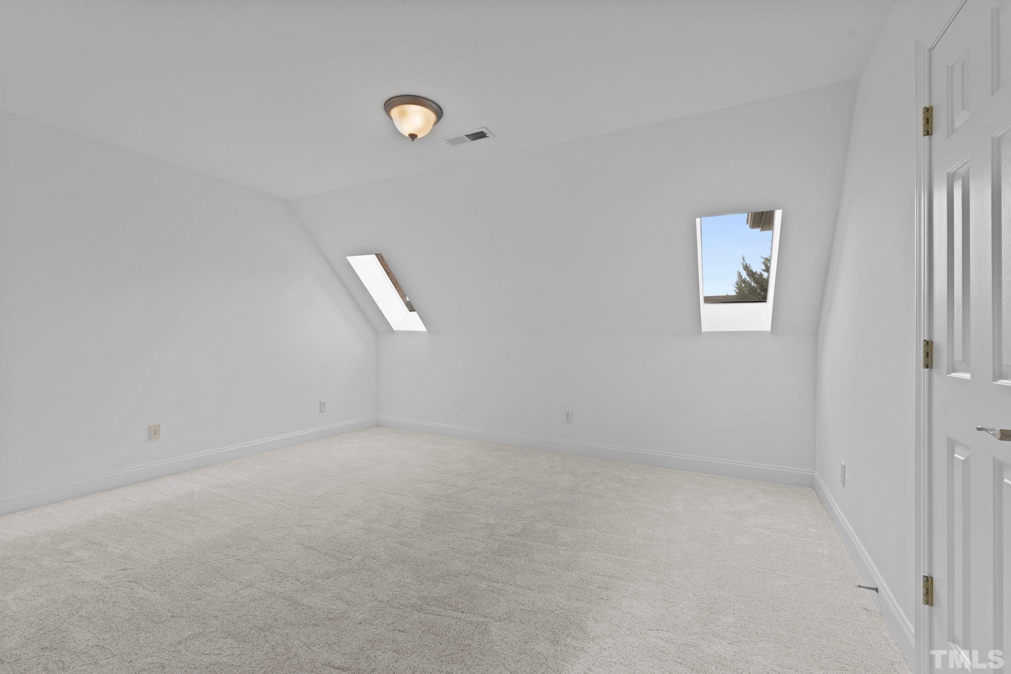 4800 Patton Ridge Court Raleigh, NC 27612 - Photo 57 of 61 an empty room with a window