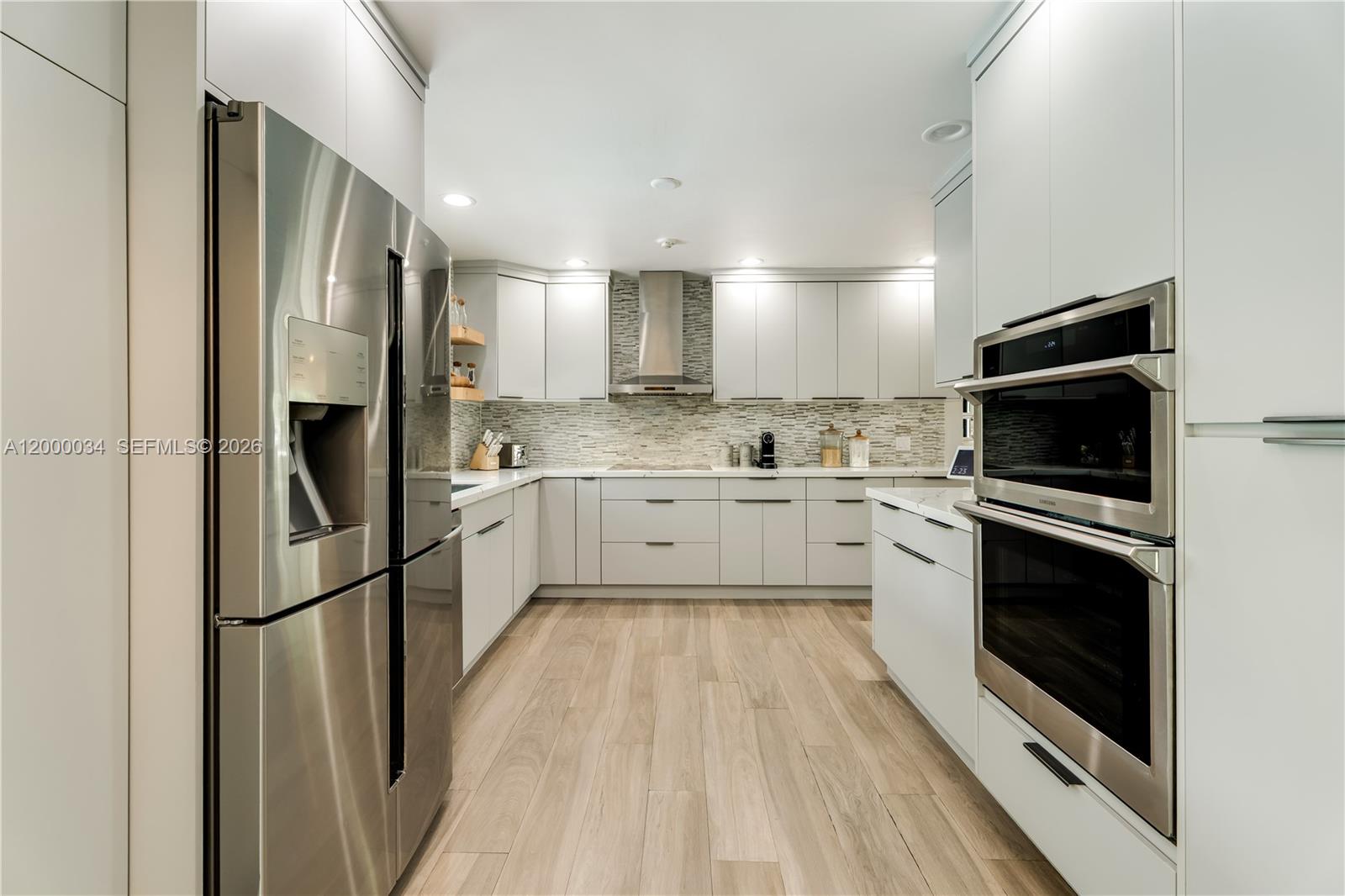 9511 Southwest 93rd Street Miami, FL 33176 - Photo 18 of 56 a kitchen with stainless steel appliances a refrigerator sink and microwave