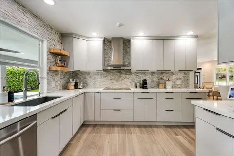 a view of swimming pool with a patio