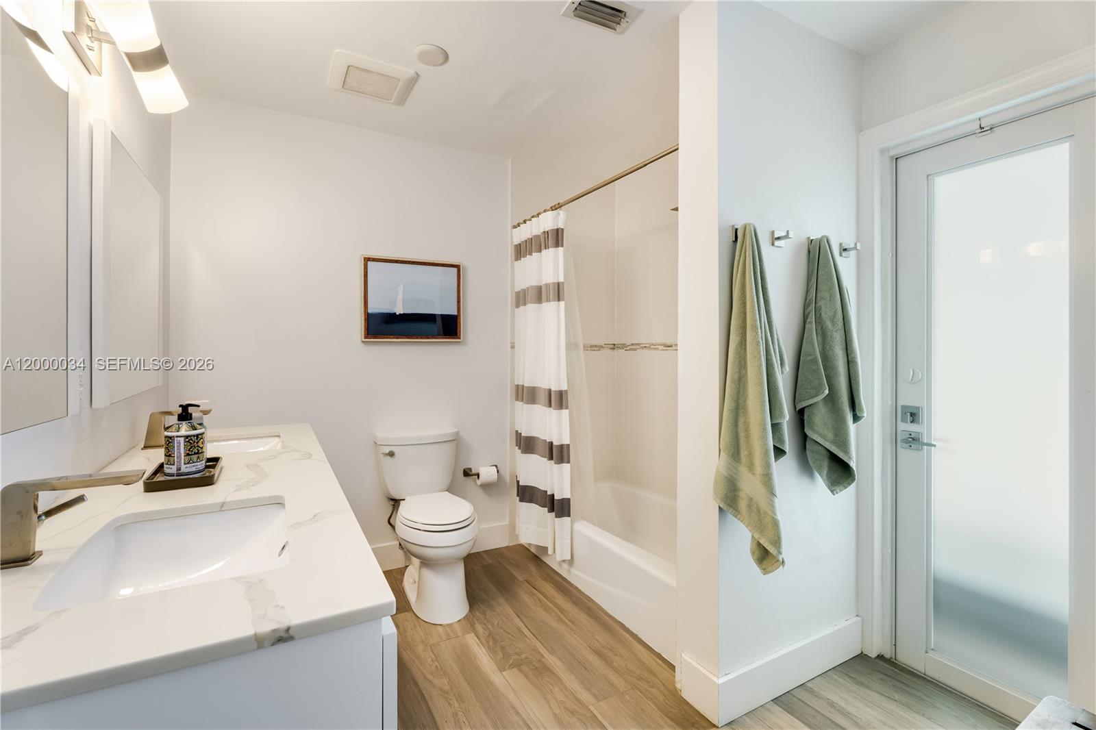 9511 Southwest 93rd Street Miami, FL 33176 - Photo 37 of 56 a bathroom with a sink toilet and shower