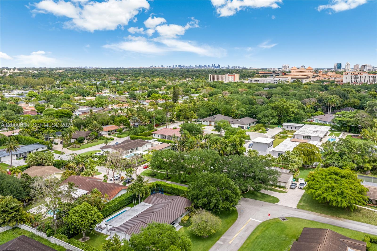 9511 Southwest 93rd Street Miami, FL 33176 - Photo 49 of 56 an aerial view of residential houses with outdoor space and trees