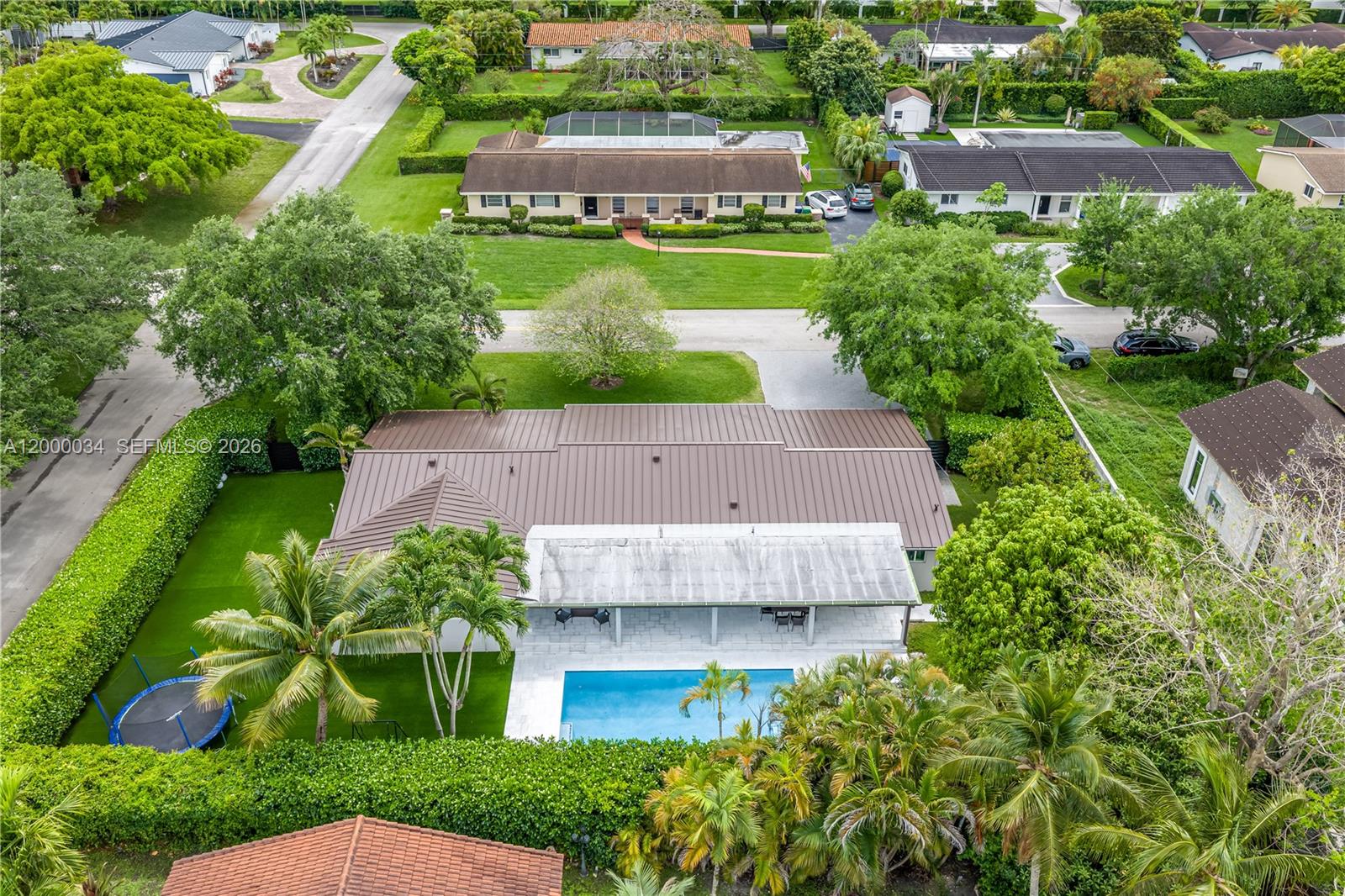 9511 Southwest 93rd Street Miami, FL 33176 - Photo 51 of 56 an aerial view of a house with a garden